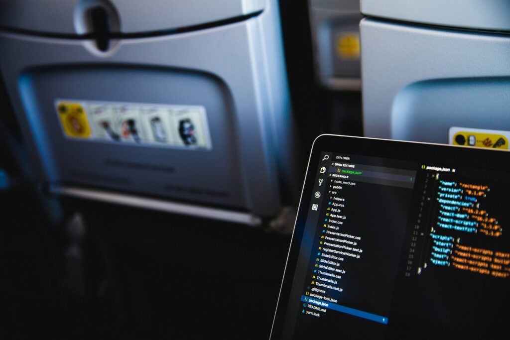 Laptop on a airplane.