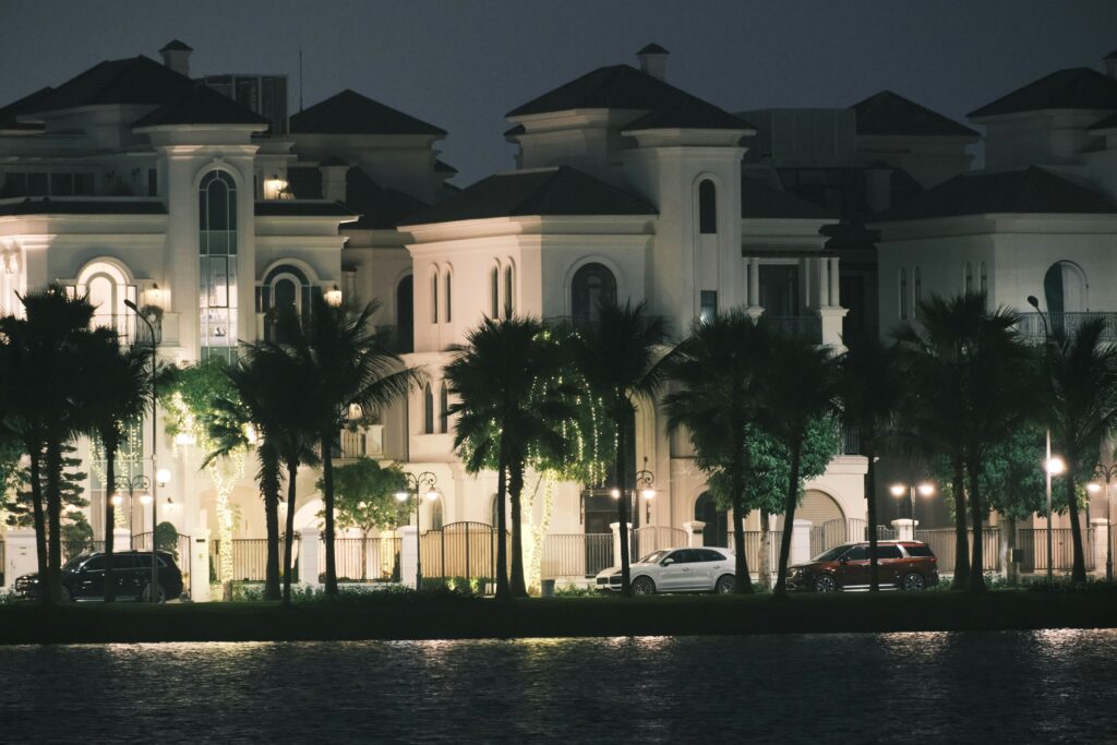 Luxury looking houses with the palm trees. 